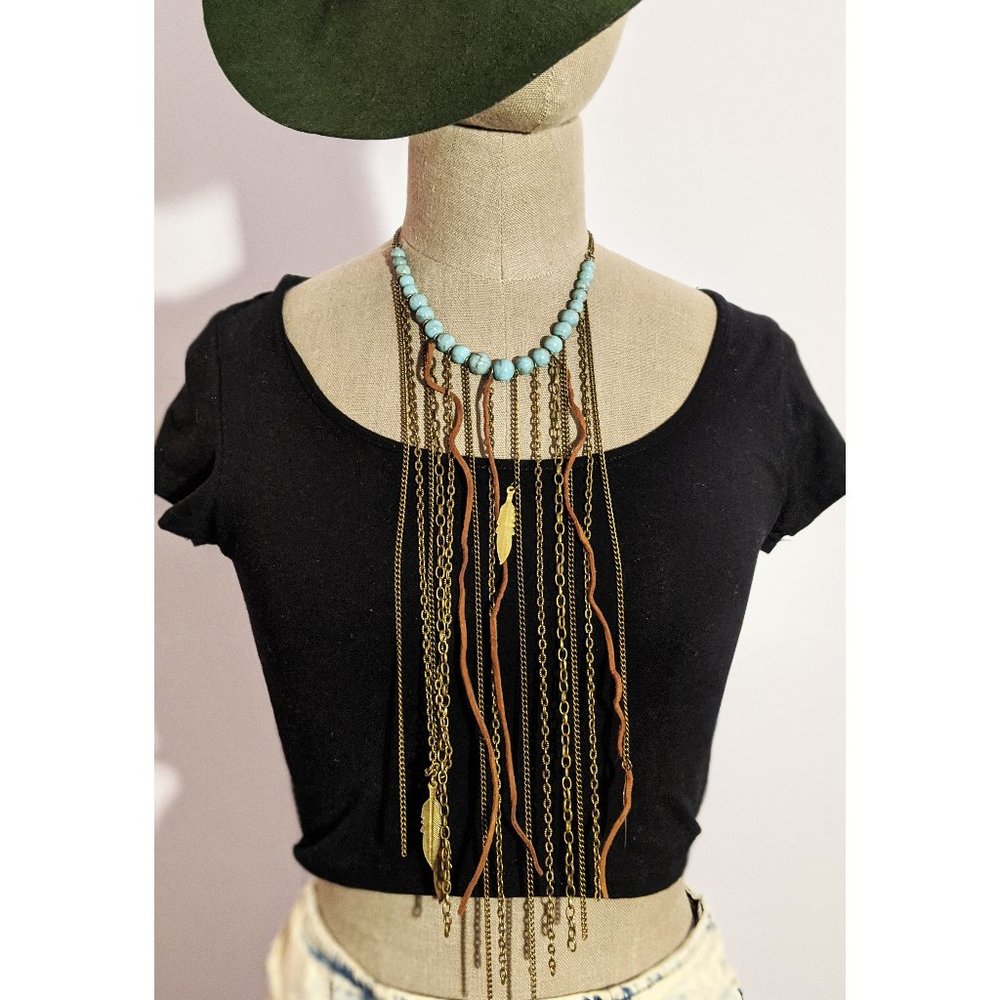 Boho turquoise brassa and leather necklace